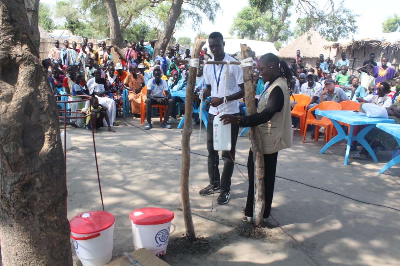 Community members at a newly drilled borehole